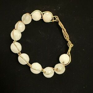 Elegant Gold and White Beaded Bracelet